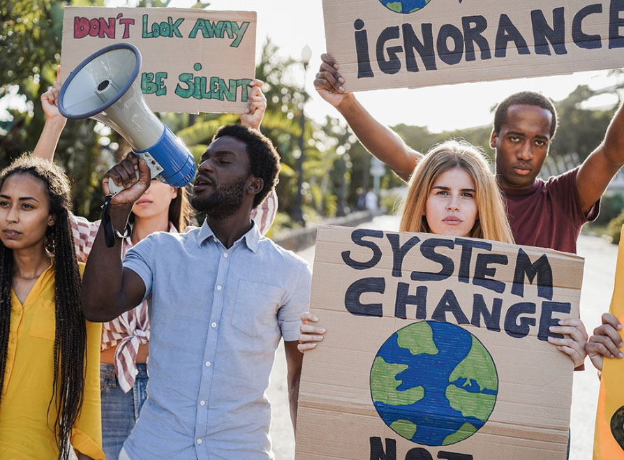 Young group of demonstrators on road from different culture and race protest for climate change