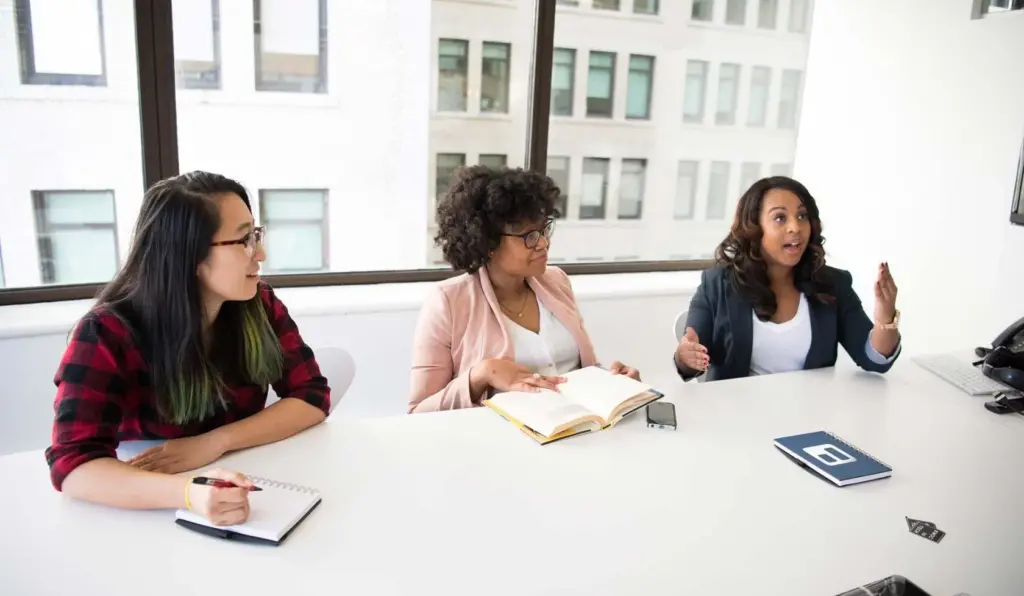 Three women in a meeting