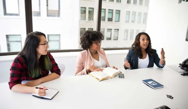 Three women in a meeting