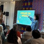 Community expert witness Melanie Minuche presents at a community meeting.
