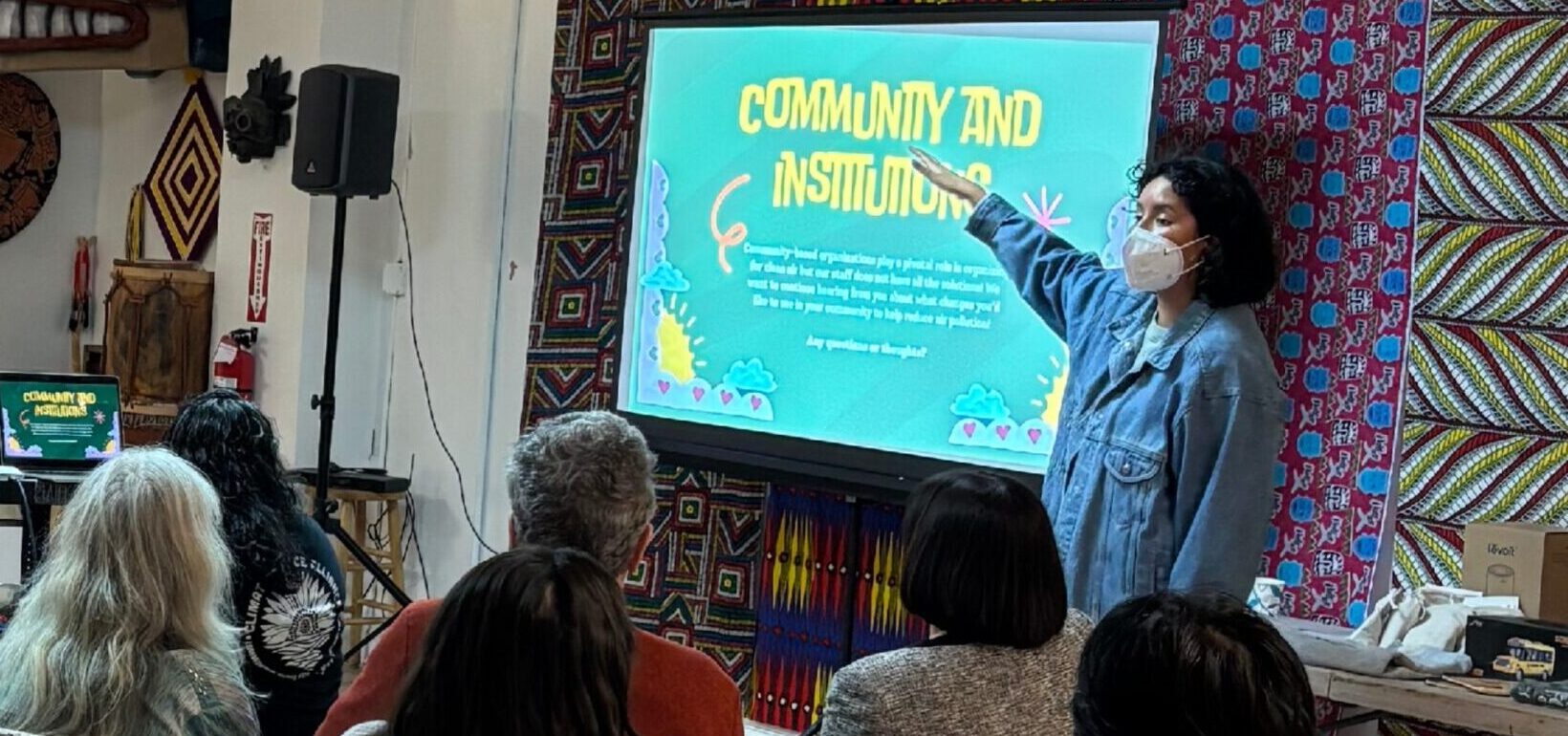 Community expert witness Melanie Minuche presents at a community meeting.